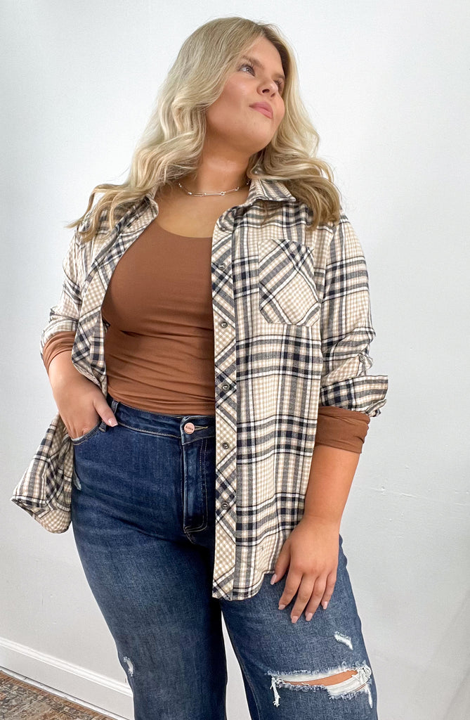 Polar Opposites Curvy Plaid Top